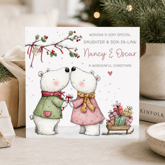 Personalised Christmas card for a couple featuring two polar bears, holly and Christmas presents, customised with names and relation.