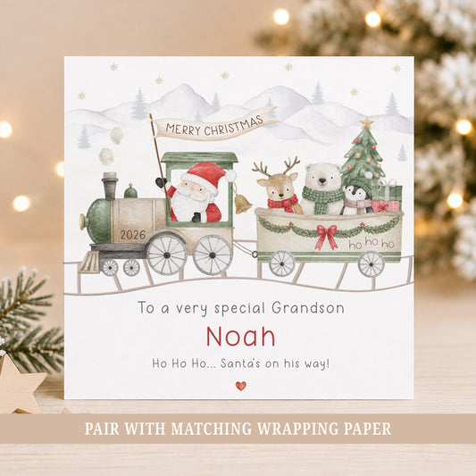 Personalised Grandson Christmas card featuring Santa on a festive train with a reindeer, polar bear and penguin, personalised with his name and relation.
