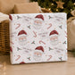 Personalised Santa Christmas wrapping paper featuring Santa faces, candy canes, holly and stars with the child’s name.