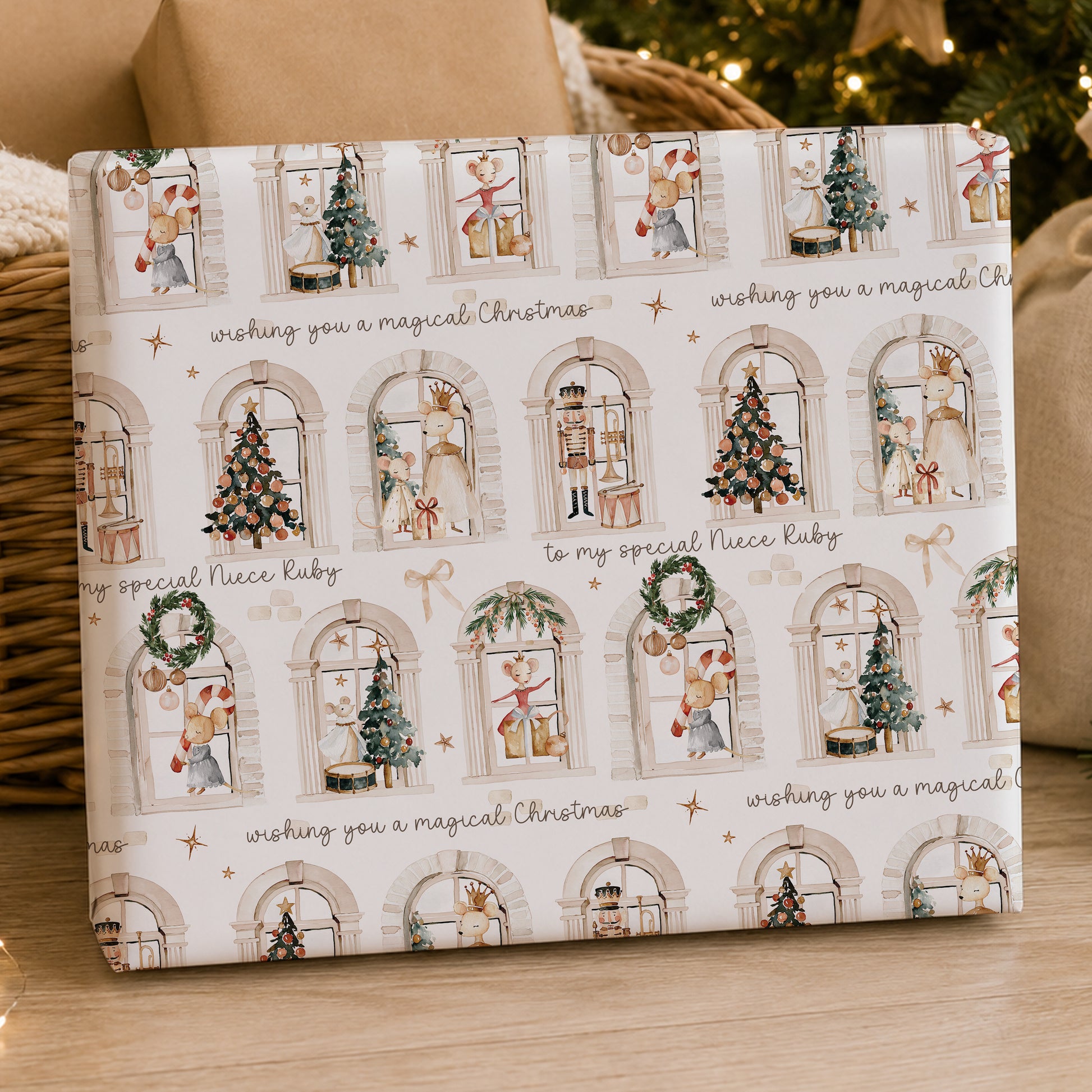 Personalised Nutcracker Christmas wrapping paper featuring festive window scenes with mice, ballerinas, Christmas trees and decorations, personalise with name and choice of relation.  
