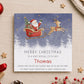 Personalised children’s Christmas card featuring Santa in a red sleigh with his reindeer flying over a snowy winter scene, personalised with any relation and child’s name.