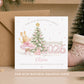 Personalised Granddaughter First Christmas 2026 greeting card featuring a sweet watercolour ballerina bunny in a pink tutu decorating a snowy Christmas tree with pink baubles and a gold star. The design includes pink Christmas presents, delicate snowflakes, a large pink 2026 and a First Christmas banner, with personalised name and relation wording. Also suitable for a Daughter, Niece or Baby Girl celebrating her first Christmas.