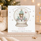 Personalised fairy Christmas card featuring a pink fairy inside a festive snow globe with Christmas tree, presents and stars, personalised with a name and relation.