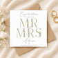 Personalised Mr & Mrs wedding card featuring floral typography, customised with the couple's surname and wedding date.