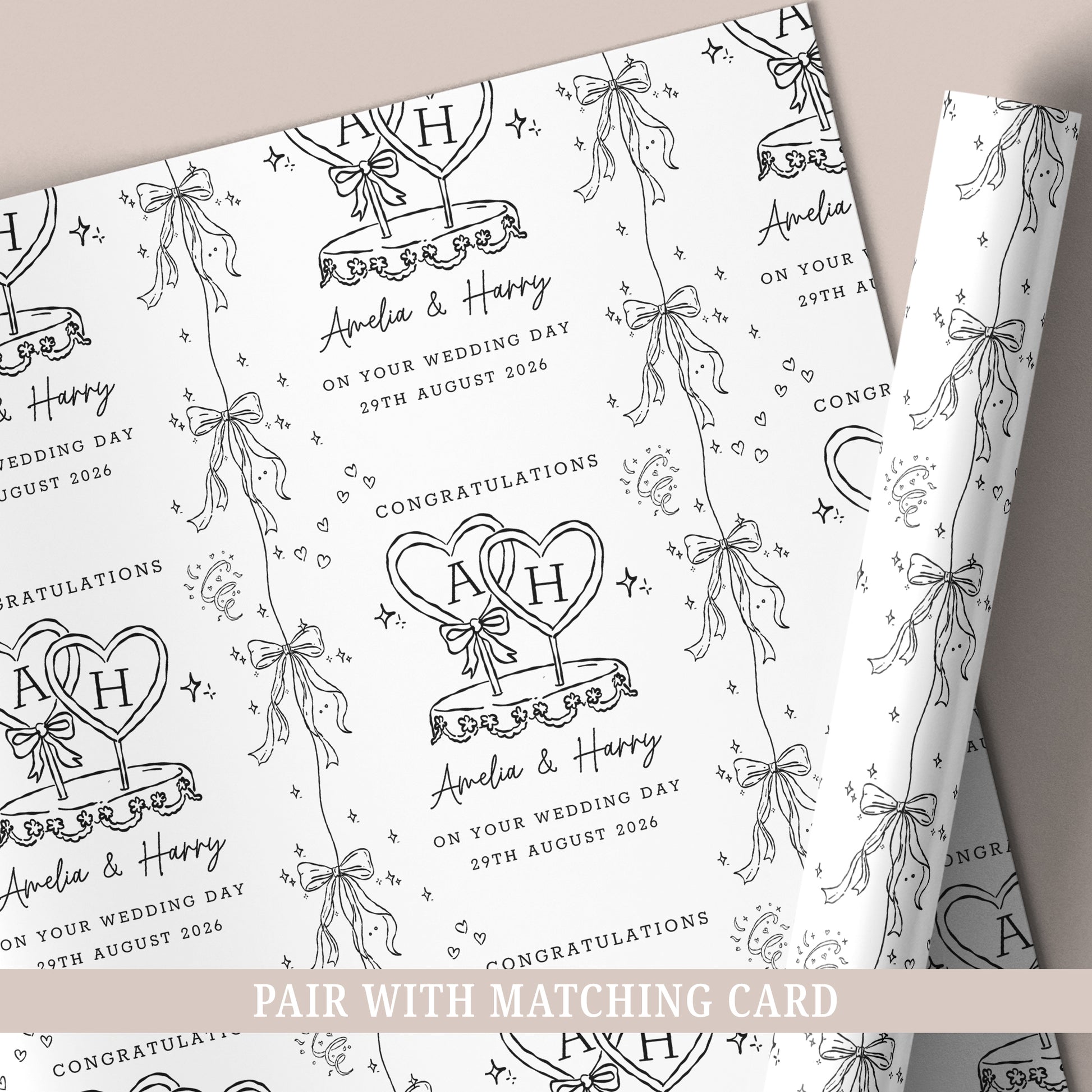 Personalised wedding wrapping paper featuring a black and white wedding cake design, customised with the couple's names and wedding date.