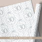 Personalised 30th birthday floral number wrapping paper with blue polka dot background and personalised name.