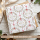Personalised Mum Christmas wrapping paper featuring an elegant red and gold festive wreath design with bows and botanical details.