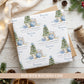 Personalised Baby’s First Christmas wrapping paper featuring a blue Christmas tree, cute mouse and bauble, personalised with the child’s name.