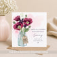 Personalised 80th birthday card featuring a floral bouquet in a glass jar, customised with any name and relation.