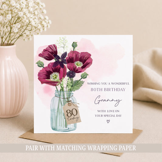 Personalised 80th birthday card featuring a floral bouquet in a glass jar, customised with any name and relation.