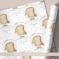 Personalised new home wrapping paper featuring a toast character holding house keys and a champagne glass