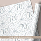 Personalised 70th birthday floral number wrapping paper with blue polka dot background and personalised name