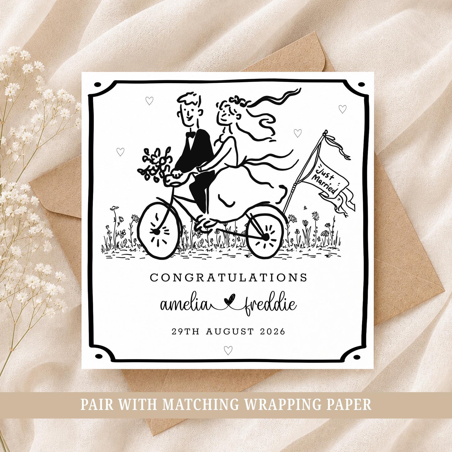 Personalised wedding card featuring a bride and groom riding a bicycle, customised with the couple's names and wedding date.