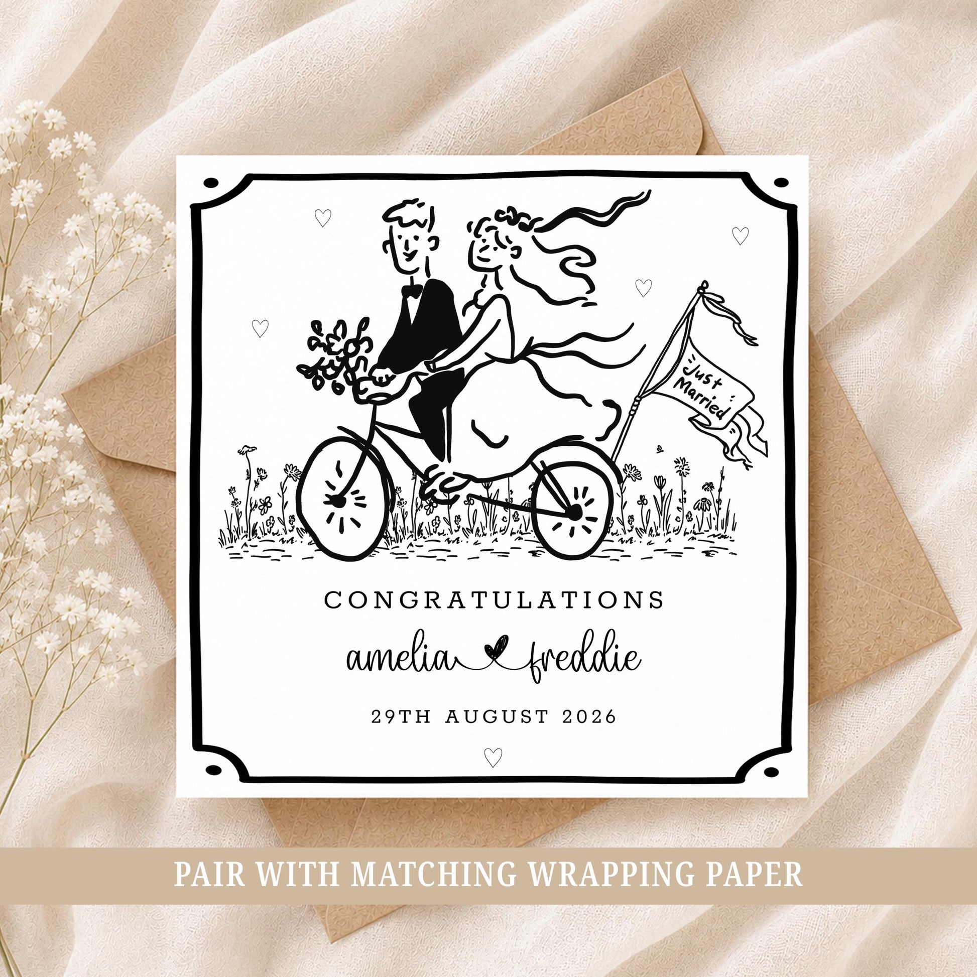 Personalised wedding card featuring a bride and groom riding a bicycle, customised with the couple's names and wedding date.