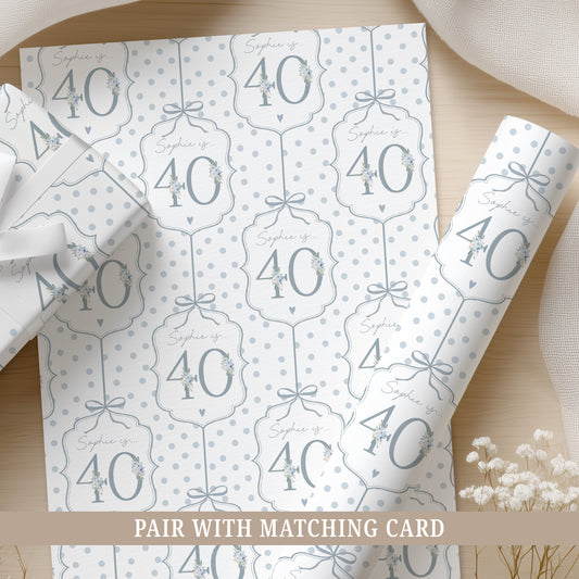 Personalised 40th birthday floral number wrapping paper with blue polka dot background and personalised name.