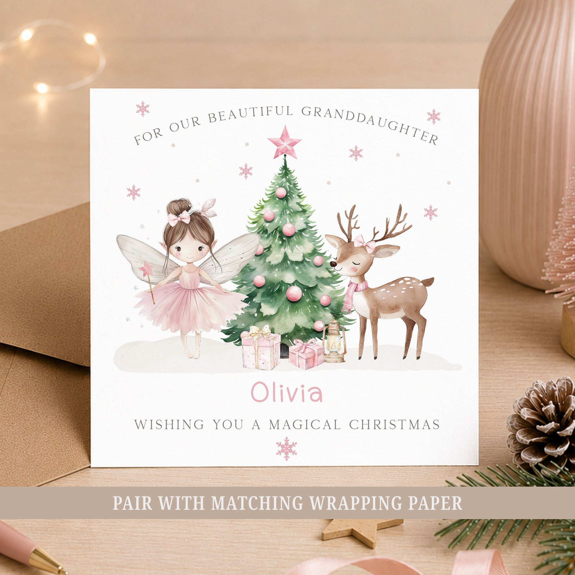 Personalised Christmas card for Granddaughter with pink fairy, Christmas tree and reindeer, customised with her name.