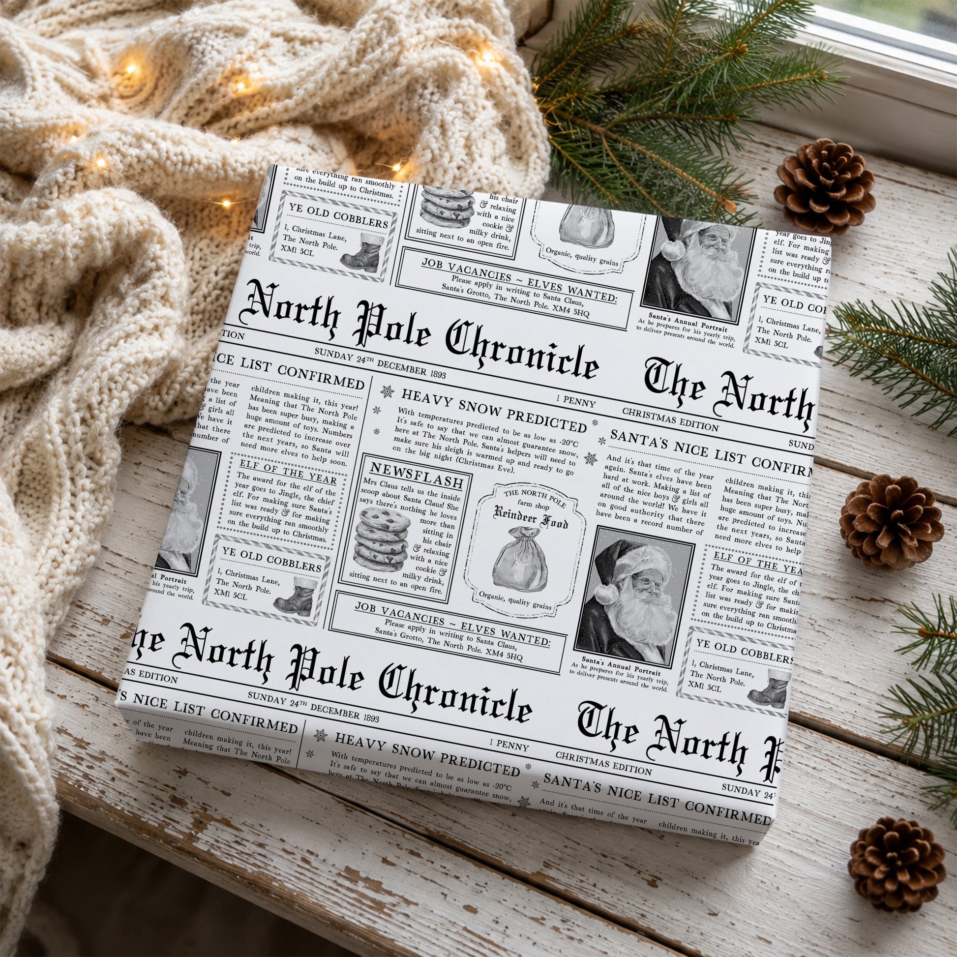 North Pole newspaper Christmas wrapping paper featuring Santa, the Nice List, festive newspaper headlines and vintage black and white Christmas illustrations.