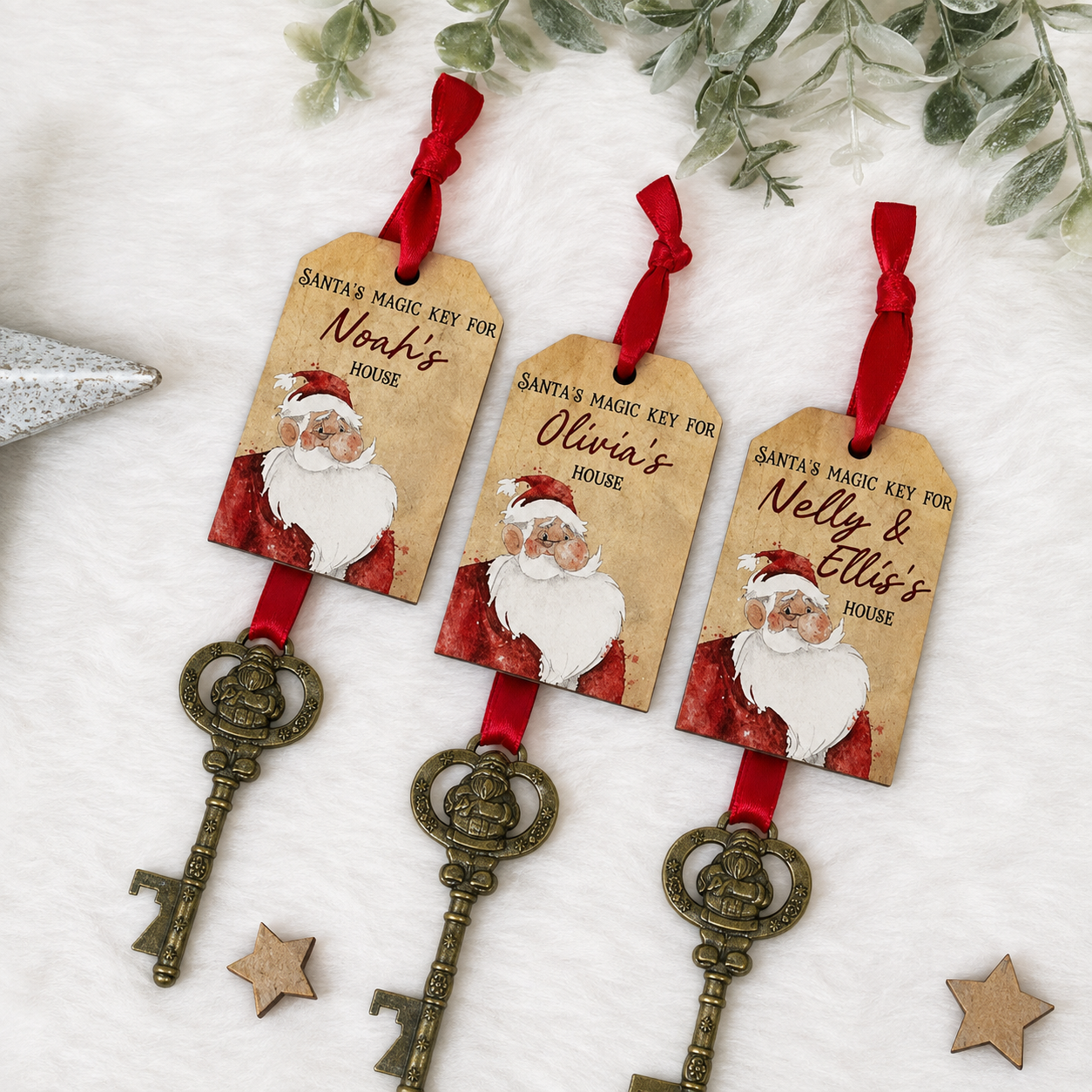 Personalised Santa's Magic Key with antique-style key, red ribbon and wooden Santa name tag for Christmas Eve.