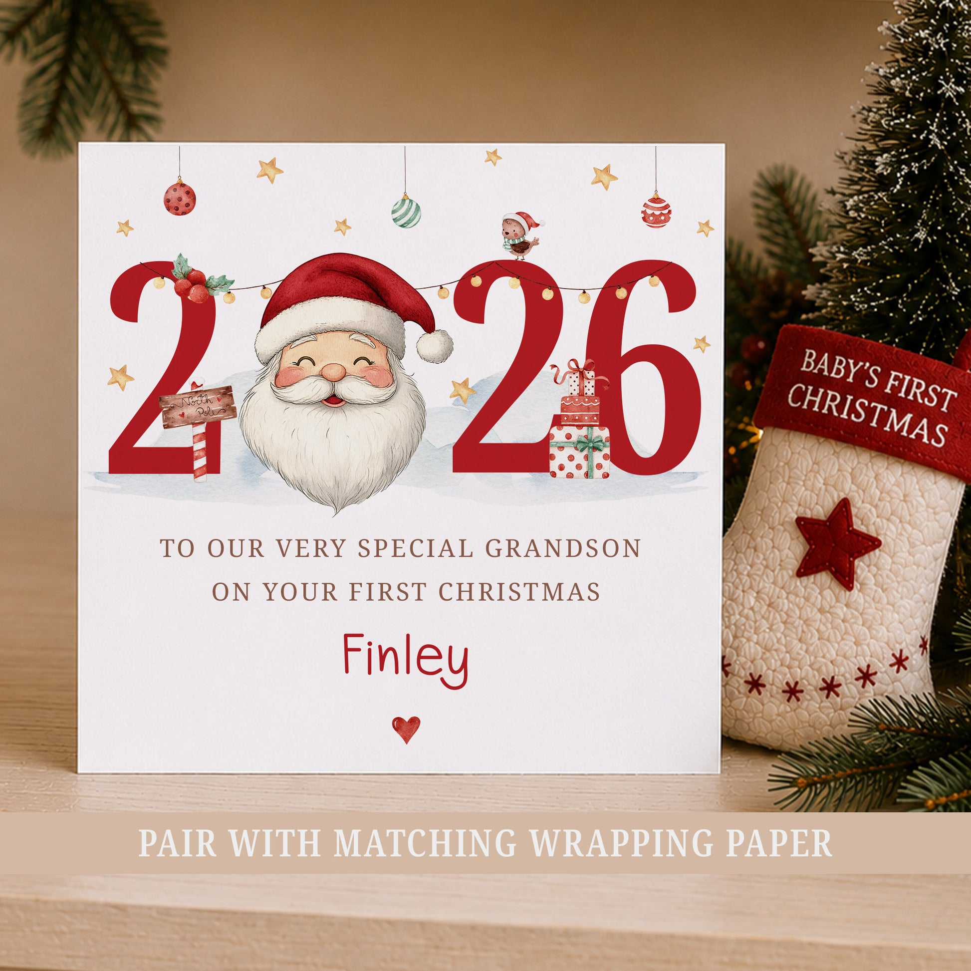 Personalised Nephew First Christmas card featuring Santa, red 2026 numbers, Christmas presents and the child's name.