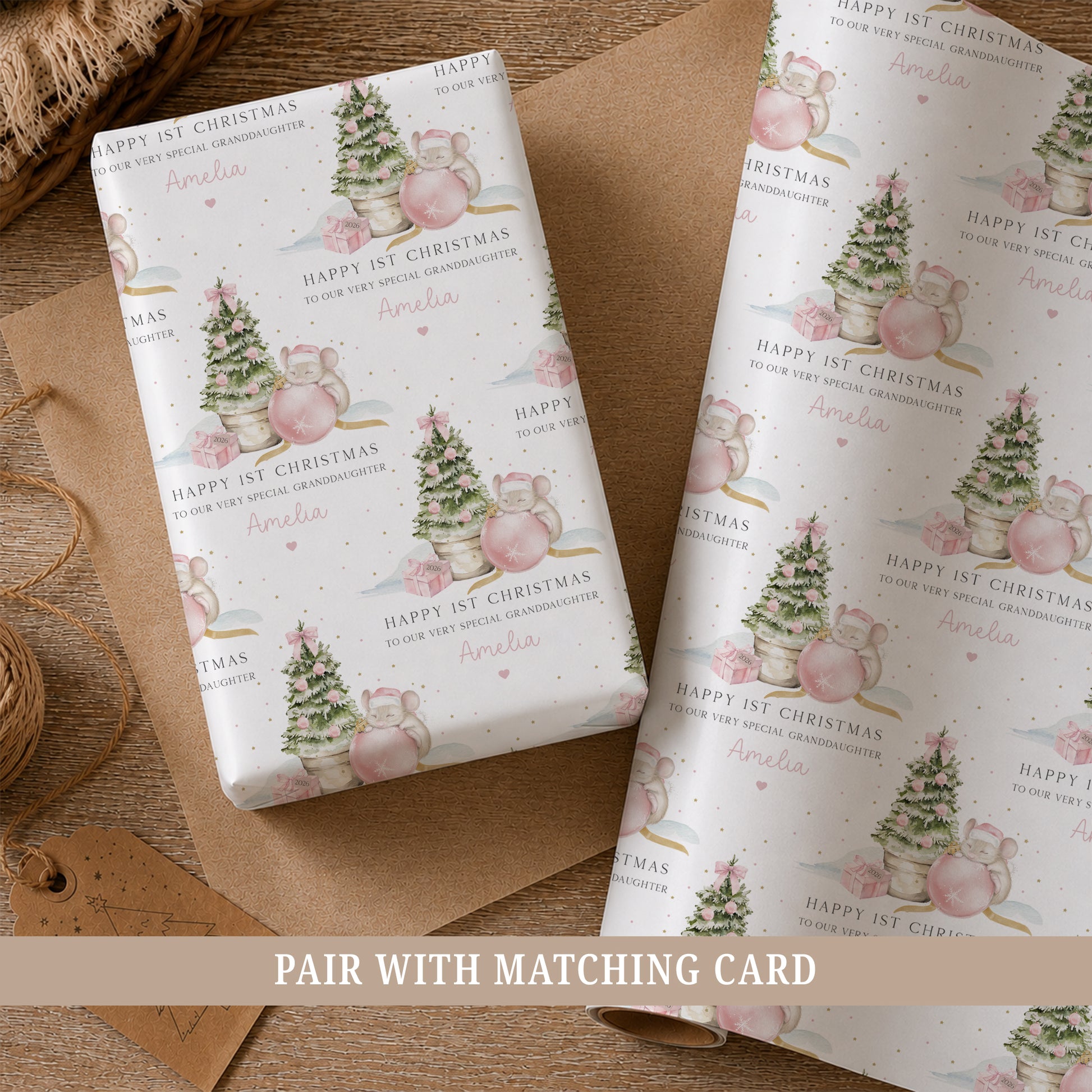 Personalised Niece First Christmas wrapping paper featuring a cute mouse, pink Christmas bauble and festive tree, personalised with her name.