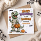 Personalised Grandson Halloween card featuring a green dinosaur dressed as a mummy, holding a pumpkin trick or treat bucket and lollipop, with bats, spider web, pumpkins and sweets. Personalised with his name and available for Grandson, Son, Nephew, Godson, Little Boy and other relations.
