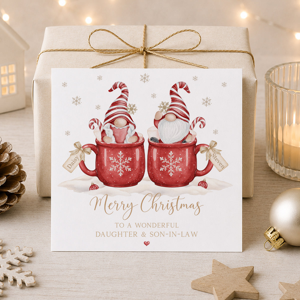 Personalised Daughter and Son-in-Law Christmas card with Christmas gnomes in red mugs, candy canes and individual name tags.